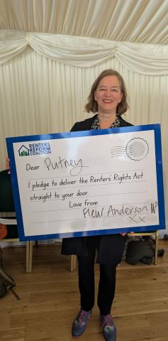 MP Fleur Anderson holding a postcard reading "Dear Putney, I pledge to deliver the Renters' Rights Act straight to your door. Love from Fleur Anderson MP xx"